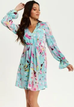 Women Liquorish Abstract Print Mini Dress With Open Back And Long Sleeves