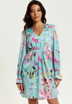 Women Liquorish Abstract Print Mini Dress With Open Back And Long Sleeves