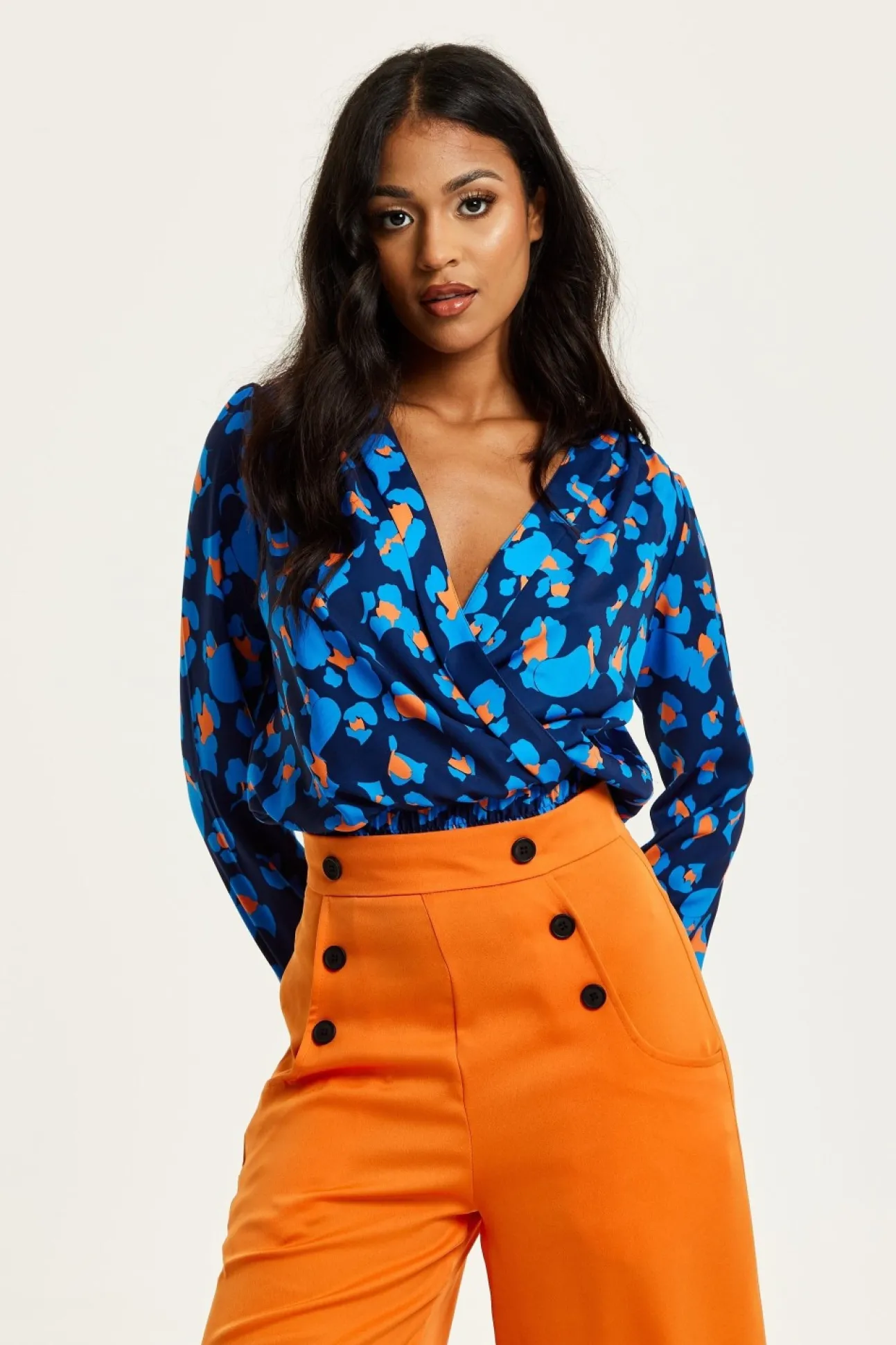 Women Liquorish Abstract Print Wrap Top In Pink Orange And Blue