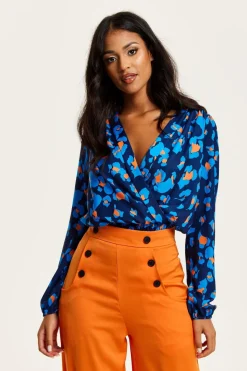 Women Liquorish Abstract Print Wrap Top In Pink Orange And Blue