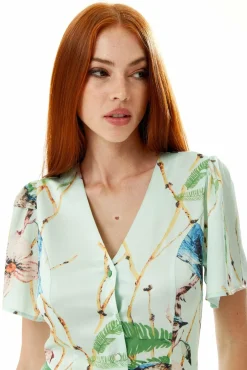 Women Liquorish Bird Print Jumpsuit In Mint Green