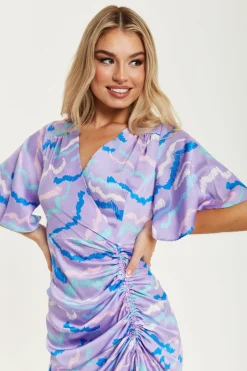 Women Liquorish Midi Wrap Dress With Abstract Zebra Print In