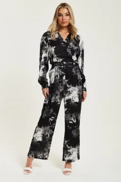 Women Liquorish Mono Abstract Print Jumpsuit With Long Sleeves