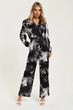 Women Liquorish Mono Abstract Print Jumpsuit With Long Sleeves