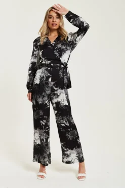 Women Liquorish Mono Abstract Print Jumpsuit With Long Sleeves