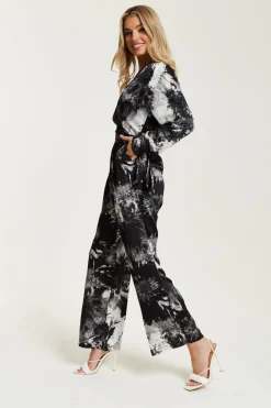 Women Liquorish Mono Abstract Print Jumpsuit With Long Sleeves