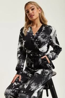 Women Liquorish Mono Abstract Print Jumpsuit With Long Sleeves